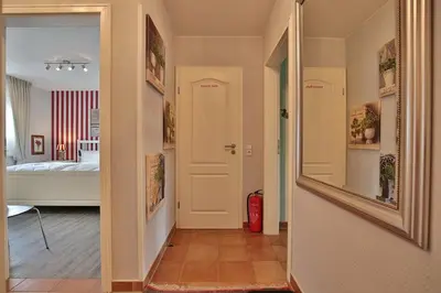 Ein Bett oder Betten in einem Zimmer der Unterkunft Sunshine-Residenz Sunshine Residenz Appartement 1 Godewind