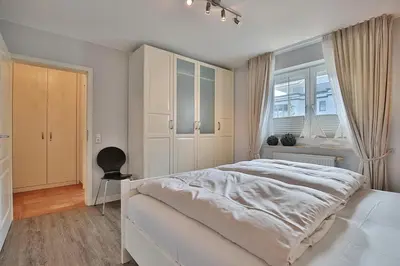 Ein Bett oder Betten in einem Zimmer der Unterkunft Sunshine-Residenz Sunshine Residenz Appartement 1 Godewind