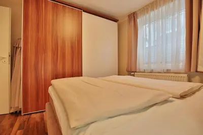 Ein Bett oder Betten in einem Zimmer der Unterkunft Domizil Strandburg Domizil Strandburg Appartement 5