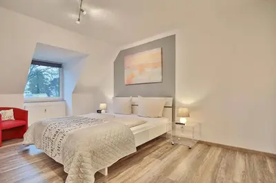 Ein Bett oder Betten in einem Zimmer der Unterkunft Domizil Strandburg Domizil Strandburg Appartement 12 Tymmendroper Türmchen