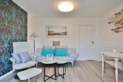 Ein Sitzbereich in der Unterkunft Haus Bergstraße 21 Haus Bergstrasse 21 Appartement 2 Glück Ahoi