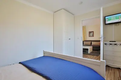 Ein Bett oder Betten in einem Zimmer der Unterkunft Ferienanlage Bergstraße 62 Ferienhaus Bergstraße 62 Appartement 9