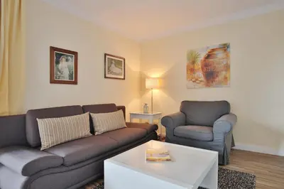 Ein Sitzbereich in der Unterkunft Ferienanlage Bergstraße 62 Ferienhaus Bergstraße 62 Appartement 9