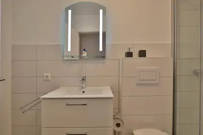 Ein Badezimmer in der Unterkunft Haus Parkblick, Timmendorfer Strand Haus Parkblick Appartement 03