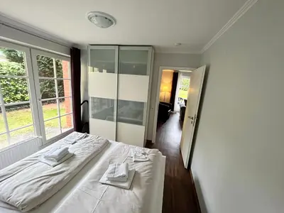 Ein Bett oder Betten in einem Zimmer der Unterkunft Haus Parkblick, Timmendorfer Strand Haus Parkblick Appartement 03