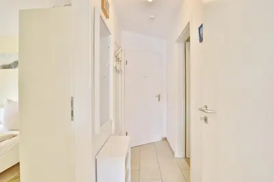 Ein Bett oder Betten in einem Zimmer der Unterkunft Haus Parkblick, Timmendorfer Strand Haus Parkblick Appartement 04