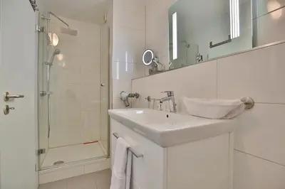 Ein Badezimmer in der Unterkunft Haus Parkblick, Timmendorfer Strand Haus Parkblick Appartement 08
