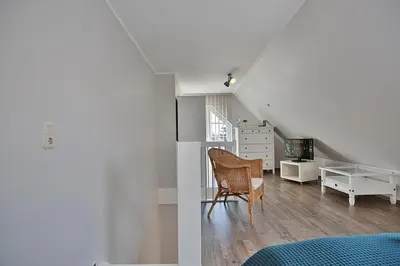 Ein Sitzbereich in der Unterkunft Haus Parkblick, Timmendorfer Strand Haus Parkblick Appartement 12