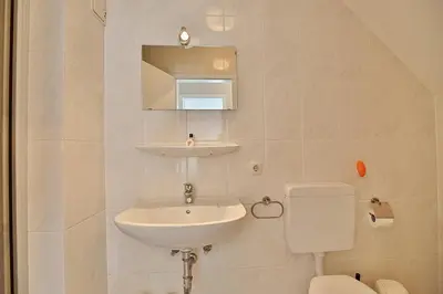Ein Badezimmer in der Unterkunft Haus Parkblick, Timmendorfer Strand Haus Parkblick Appartement 12