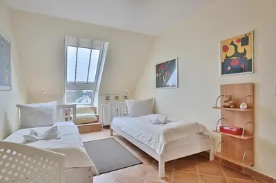Ein Bett oder Betten in einem Zimmer der Unterkunft Domizil Strandburg Domizil Strandburg Appartement 25