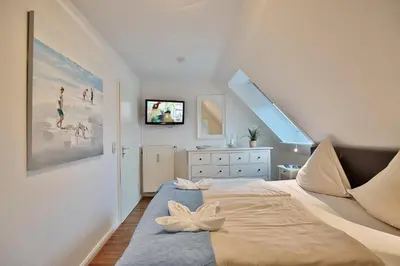 Ein Bett oder Betten in einem Zimmer der Unterkunft Im Brook 36-38 Am Elchgrund Appartement 12