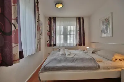Ein Bett oder Betten in einem Zimmer der Unterkunft Domizil Gartenstraße Domizil Gartenstraße 4 Appartement 4