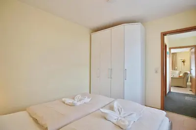 Ein Bett oder Betten in einem Zimmer der Unterkunft Gorch-Fock-Park Haus 06 Gorch-Fock-Park 6 Appartement 5