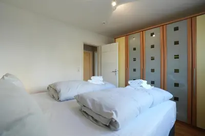 Ein Bett oder Betten in einem Zimmer der Unterkunft Bädervilla am Höppnerweg Bädervilla am Höppnerweg Appartement 03