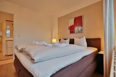 Ein Bett oder Betten in einem Zimmer der Unterkunft Bädervilla am Höppnerweg Bädervilla am Höppnerweg Appartement 06