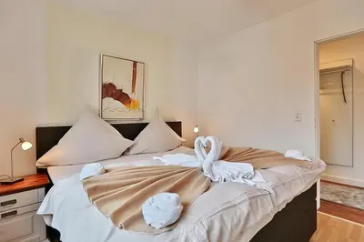 Ein Bett oder Betten in einem Zimmer der Unterkunft Bädervilla am Höppnerweg Bädervilla am Höppnerweg Appartement 07