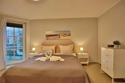 Ein Bett oder Betten in einem Zimmer der Unterkunft Maison Baltique Niendorf Maison Baltique Appartement 01