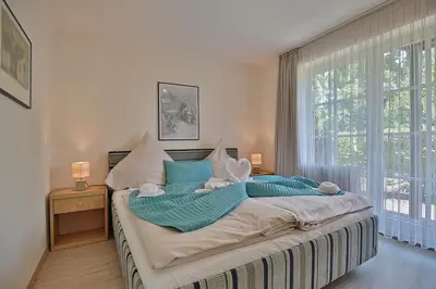 Ein Bett oder Betten in einem Zimmer der Unterkunft Am Rosenhain 6 Am Rosenhain 6 Appartement 3