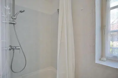 Ein Badezimmer in der Unterkunft Am Rosenhain 6 Am Rosenhain 6 Appartement 3