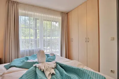 Ein Bett oder Betten in einem Zimmer der Unterkunft Am Rosenhain 6 Am Rosenhain 6 Appartement 3