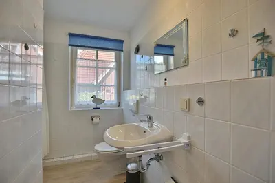 Ein Badezimmer in der Unterkunft Am Rosenhain 6 Am Rosenhain 6 Appartement 3