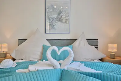 Ein Bett oder Betten in einem Zimmer der Unterkunft Am Rosenhain 6 Am Rosenhain 6 Appartement 3