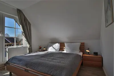 Ein Bett oder Betten in einem Zimmer der Unterkunft Am Rosenhain 6 Am Rosenhain 6 Appartement 4