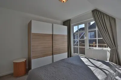 Ein Bett oder Betten in einem Zimmer der Unterkunft Am Rosenhain 6 Am Rosenhain 6 Appartement 4