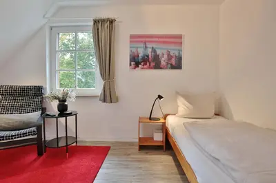Ein Bett oder Betten in einem Zimmer der Unterkunft Am Rosenhain 6 Am Rosenhain 6 Appartement 4