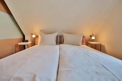 Ein Bett oder Betten in einem Zimmer der Unterkunft Sunshine-Residenz Sunshine Residenz Appartement 5