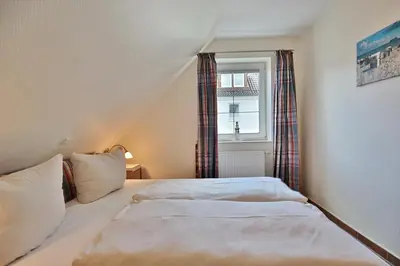 Ein Bett oder Betten in einem Zimmer der Unterkunft Sunshine-Residenz Sunshine Residenz Appartement 5