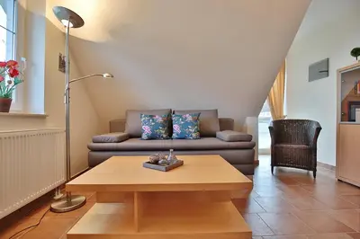 Ein Sitzbereich in der Unterkunft Sunshine-Residenz Sunshine Residenz Appartement 5