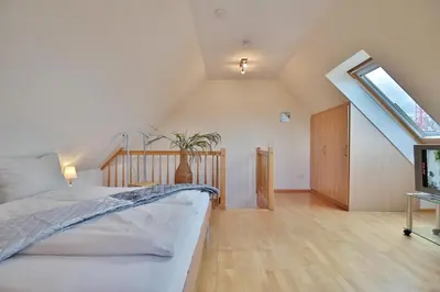 Ein Bett oder Betten in einem Zimmer der Unterkunft Sunshine-Residenz Sunshine Residenz Appartement 6