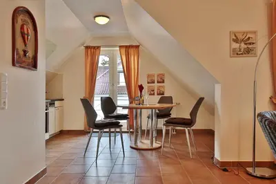 Ein Sitzbereich in der Unterkunft Sunshine-Residenz Sunshine Residenz Appartement 6