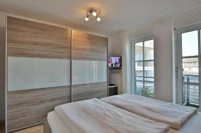 Ein Bett oder Betten in einem Zimmer der Unterkunft Residenz Wolburgstraße Residenz Wolburgstraße Appartement 2