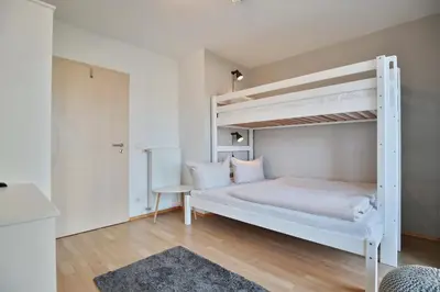 Ein Bett oder Betten in einem Zimmer der Unterkunft Residenz Wolburgstraße Residenz Wolburgstraße Appartement 2