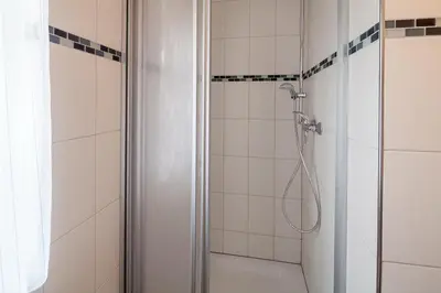Ein Badezimmer in der Unterkunft Am Rosenhain 6 Am Rosenhain 6 Appartement 1