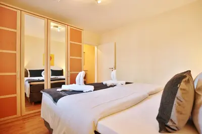 Ein Bett oder Betten in einem Zimmer der Unterkunft Villa am Meer Villa am Meer Strandallee 48 Appartement 07