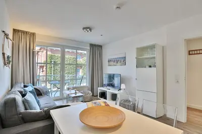 Ein Sitzbereich in der Unterkunft Maison Baltique Niendorf Maison Baltique Appartement 03