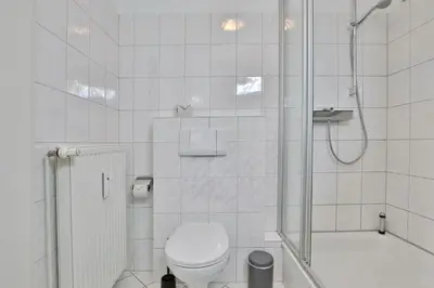 Ein Badezimmer in der Unterkunft Maison Baltique Niendorf Maison Baltique Appartement 03