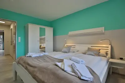 Ein Bett oder Betten in einem Zimmer der Unterkunft Kurparkresidenz-Timmendorfer Strand Kurparkresidenz-Timmendorfer Strand Appartement 25