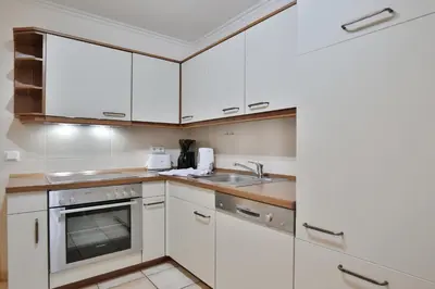 Küche/Küchenzeile in der Unterkunft Moderne Strandvilla Moderne Strandvilla Appartement 4
