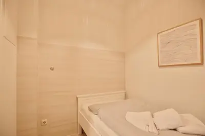 Ein Bett oder Betten in einem Zimmer der Unterkunft Moderne Strandvilla Moderne Strandvilla Appartement 4