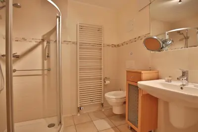 Ein Badezimmer in der Unterkunft Moderne Strandvilla Moderne Strandvilla Appartement 2