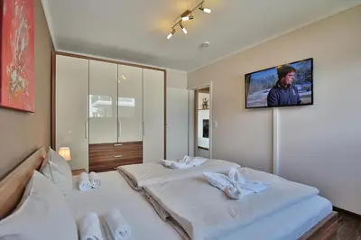 Ein Bett oder Betten in einem Zimmer der Unterkunft Residenz Herrenbruchstr Residenz Herrenbruchstraße 5 Appartement 4