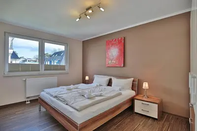 Ein Bett oder Betten in einem Zimmer der Unterkunft Residenz Herrenbruchstr Residenz Herrenbruchstraße 5 Appartement 4