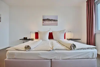 Ein Bett oder Betten in einem Zimmer der Unterkunft Villa Mér Baltique Villa Mér Baltique Appartement 13