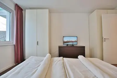 Ein Bett oder Betten in einem Zimmer der Unterkunft Villa Mér Baltique Villa Mér Baltique Appartement 13