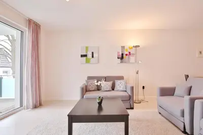 Ein Sitzbereich in der Unterkunft Villa Mér Baltique Villa Mér Baltique Appartement 13