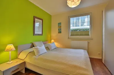 Ein Bett oder Betten in einem Zimmer der Unterkunft Residenz Herrenbruchstr Residenz Herrenbruchstraße 5 Appartement 1
